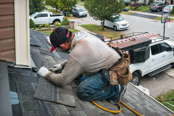Professional Roofing technician working in Bethpage, NY